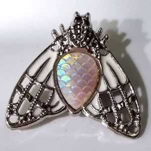 Small brooch . Great to add to clothing, bags , scarfs.